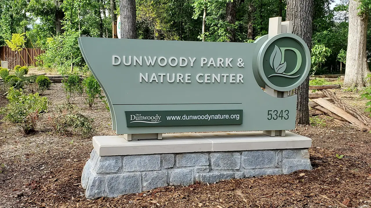 The entrance sign at Dunwoody Park and Nature Center on Roberts Drive