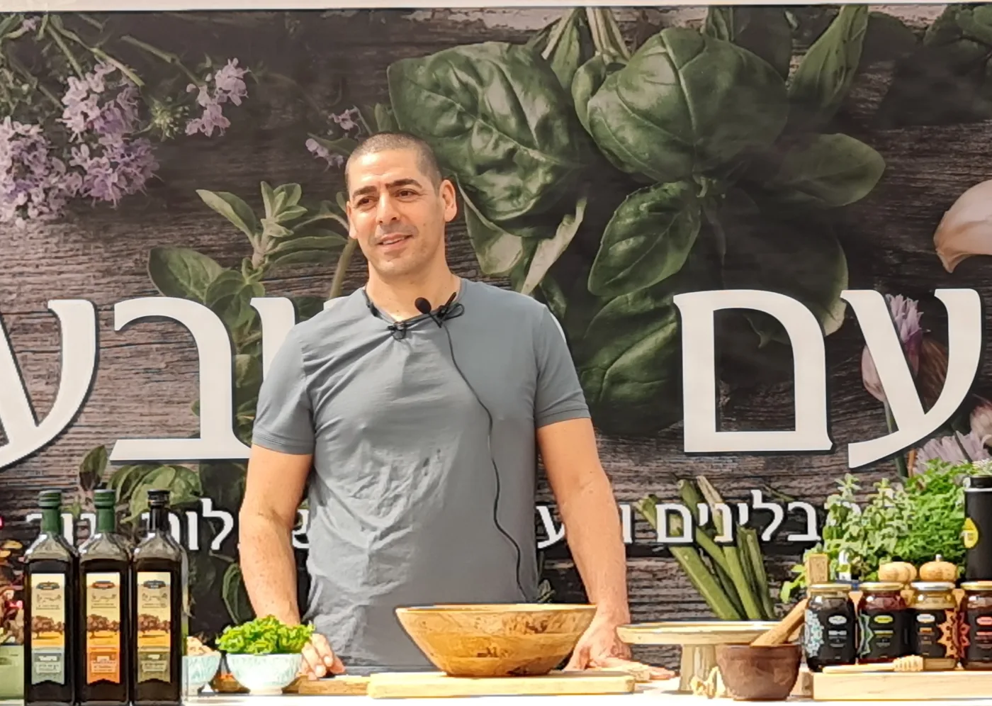 Chef Yossi Shitrit leading a cooking workshop at a garden center in Yagur, Israel
